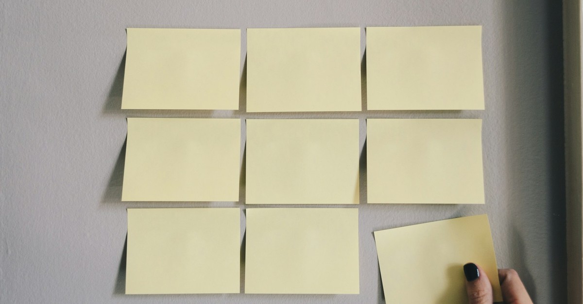 Sticky notes and project planning at a Kanban board